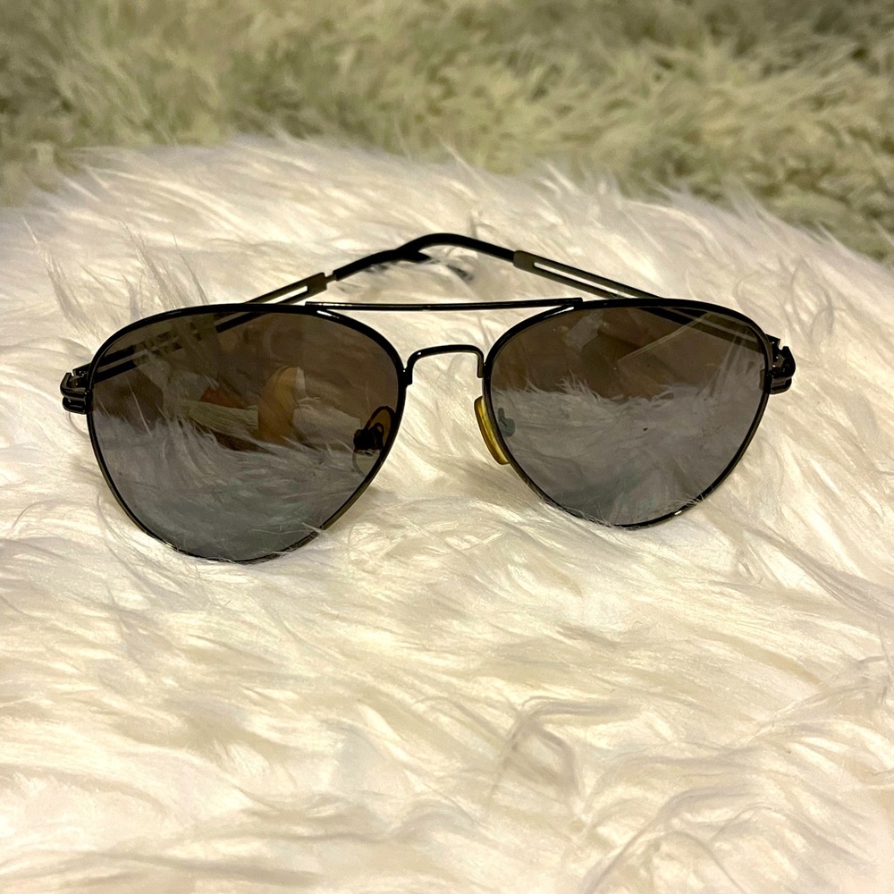 Black aviator sunglasses, dark tint